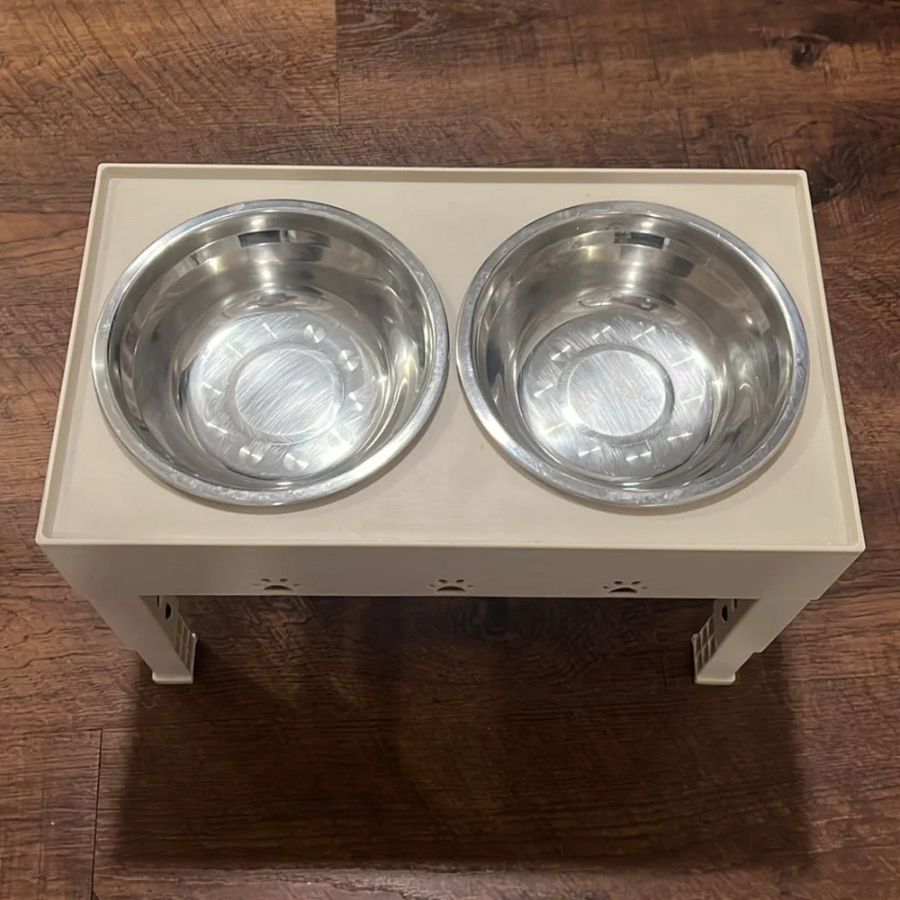 Cream Colored Dog Feeder and Bowls